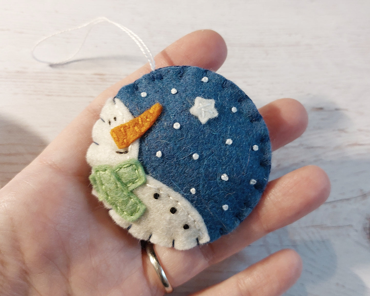 Blue bauble ornament with snowman, felt decoration