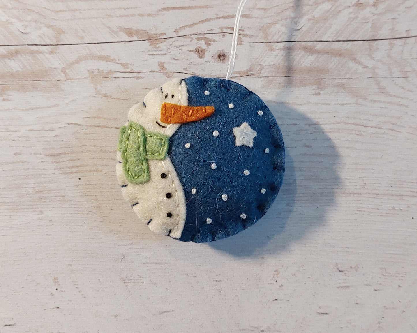 Blue bauble ornament with snowman, felt decoration