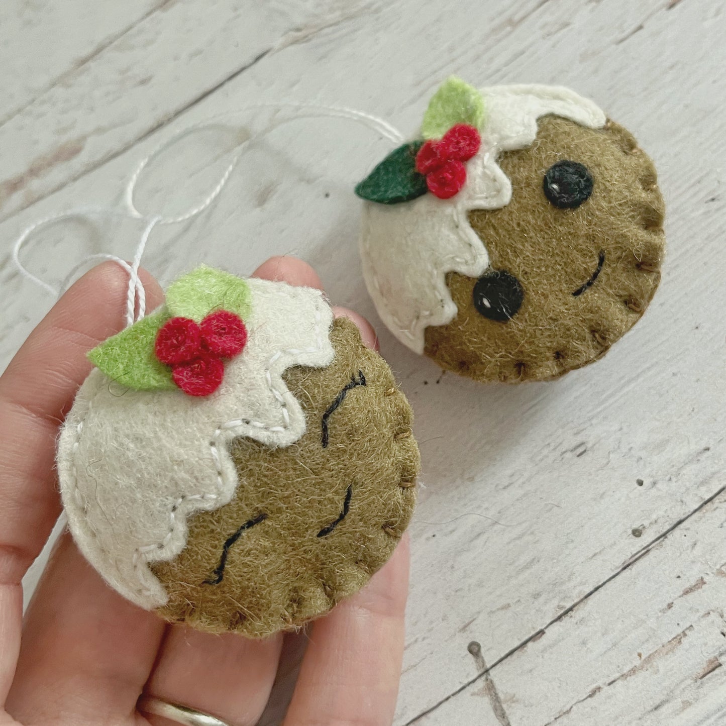 Gingerbread cookie ornament with leaves, smiling star heart and round face