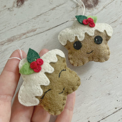 Gingerbread cookie ornament with leaves, smiling star heart and round face