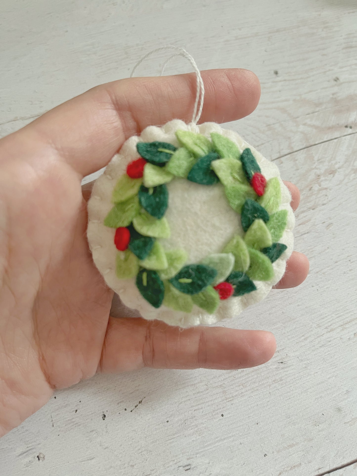 Felt Christmas round ornament with wreath leaves